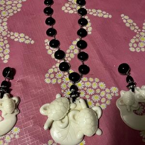 Elegant Black and Cream Turtle Pendant Necklace